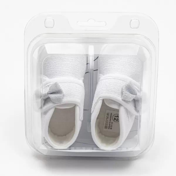 New Baby Kojenecké capáčky s mašličkou bílá 0-3 m