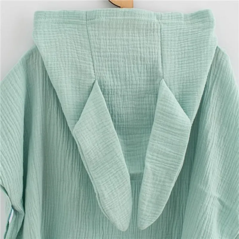 New Baby Dětské mušelínové pončo Feeling mint 50 cm